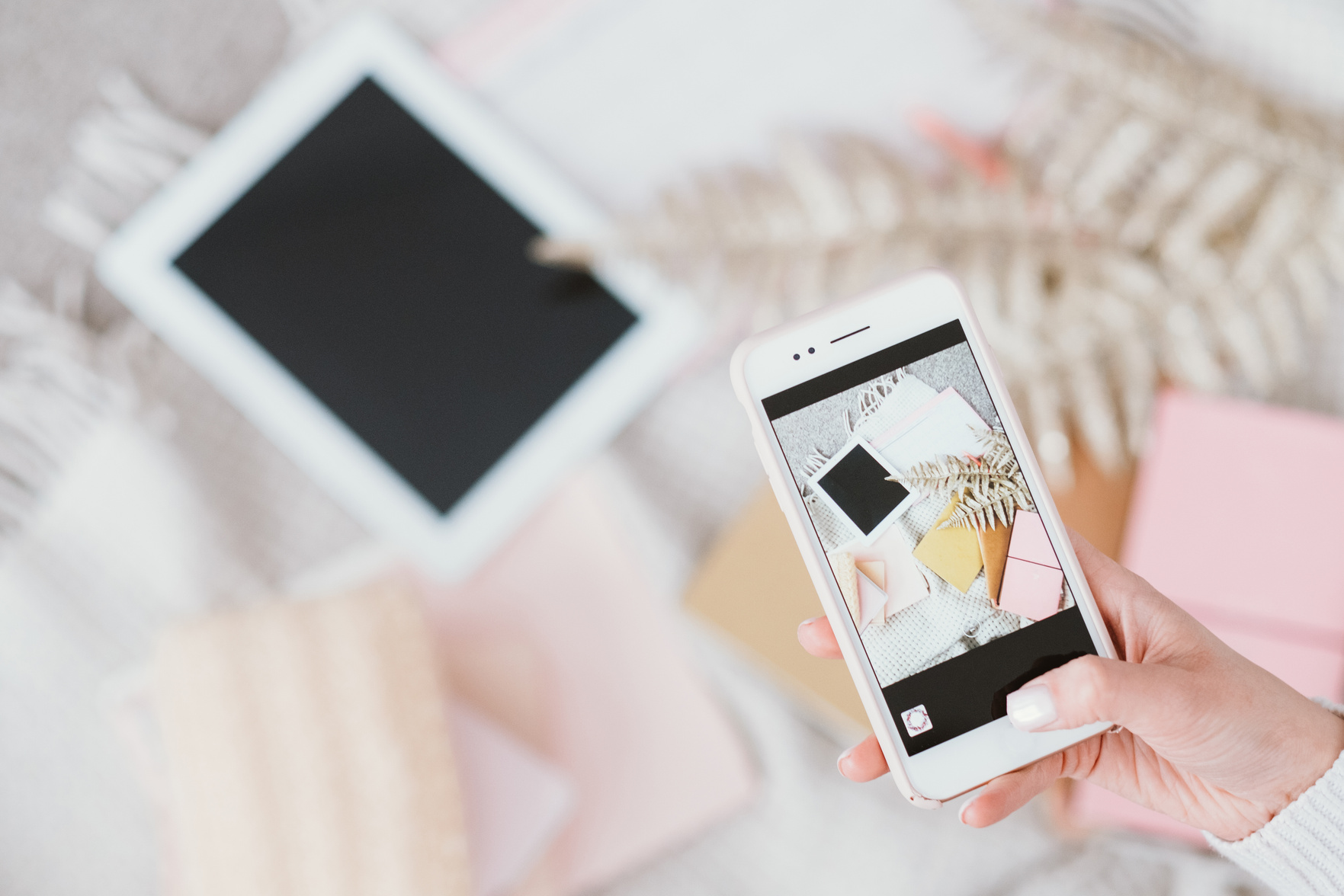 someone taking a picture of products
